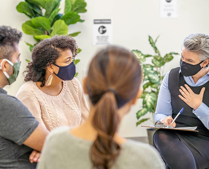 Uplifted Grief - counseling group seated in circle